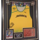 SIGNED PICTURE WITH USAIN BOLT JAMAICA VEST