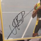 USIAN BOLT SIGNED PHOTO WITH JAMAICA VEST